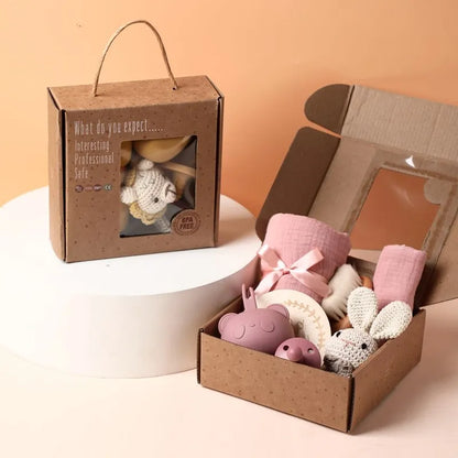 Coffret cadeau bébé 7 pièces : jouets de bain, serviette, couverture, hochet et accessoires pour les étapes importantes