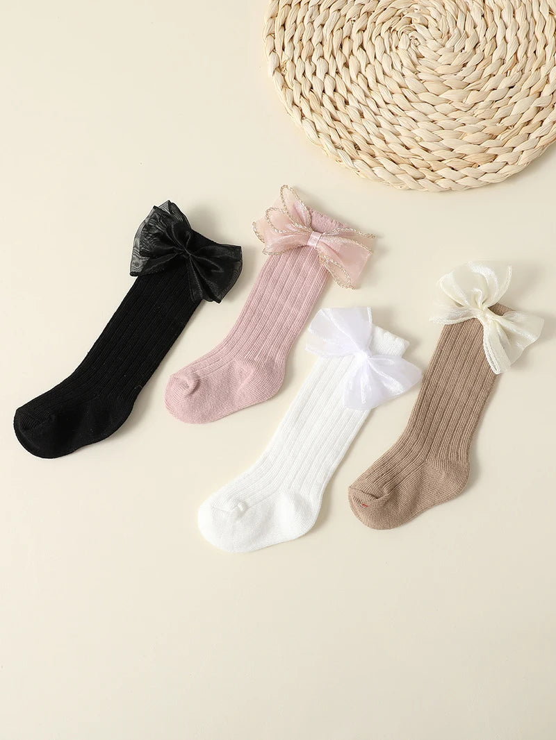 Lot de 4 paires de chaussettes d'automne pour bébé fille – Chaussettes mi-hautes à nœud de couleur unie (0-2 ans)