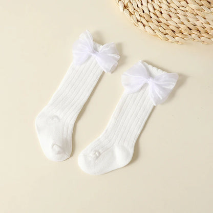 Lot de 4 paires de chaussettes d'automne pour bébé fille – Chaussettes mi-hautes à nœud de couleur unie (0-2 ans)