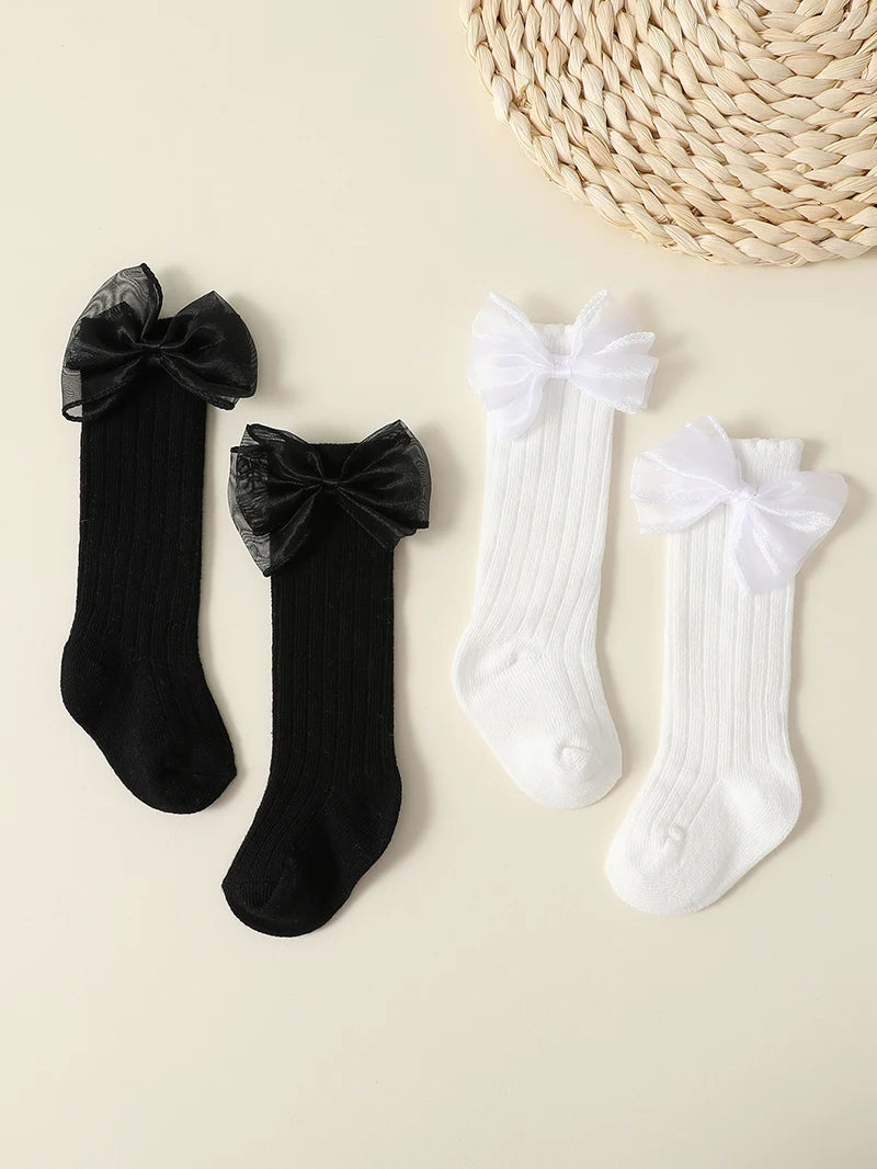 Lot de 4 paires de chaussettes d'automne pour bébé fille – Chaussettes mi-hautes à nœud de couleur unie (0-2 ans)